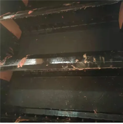 Banda transportoare cu perete lateral ondulat anti-lipire